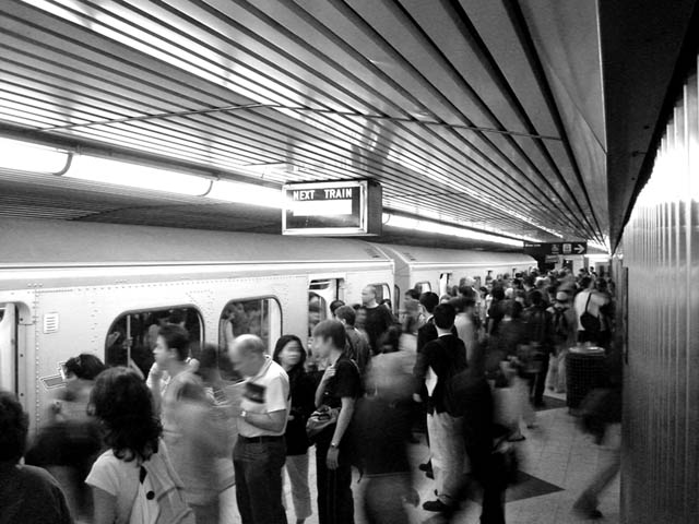 black and white, photograph, toronto, TTC, Bloor Station, crowds, subway train